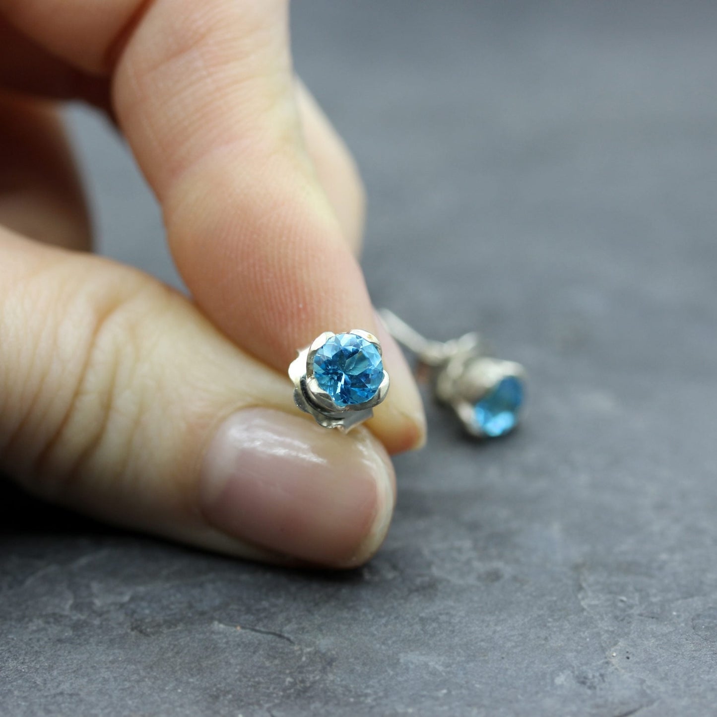 JS Round Brilliant Cut Topaz Set In Sterling Silver Stud Earrings