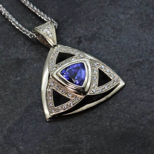 Trillion Cut Tanzanite & Diamonds Set In 18ct White Gold Pendant