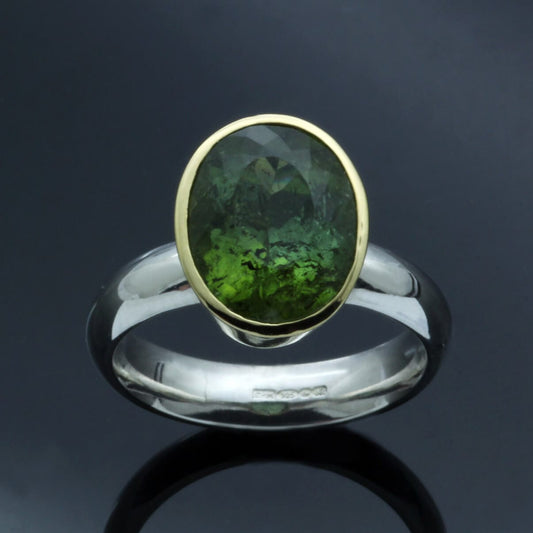 JS OVAL CUT BRAZILIAN TOURMALINE SET IN 18CT YELLOW GOLD & STERLING SILVER