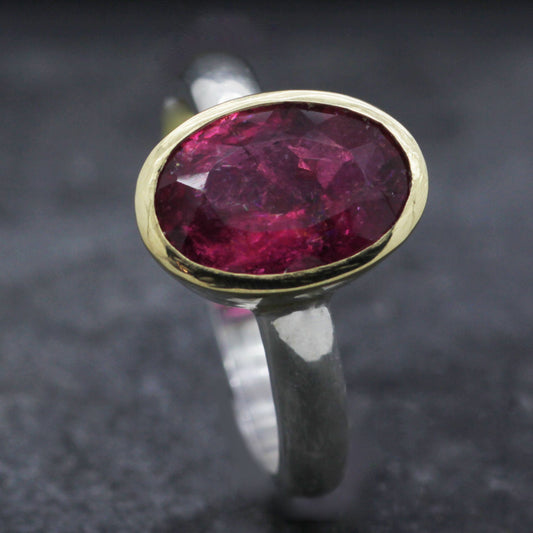 JS OVAL PINK TOURMALINE SET IN 18CT YELLOW GOLD & STERLING SILVER