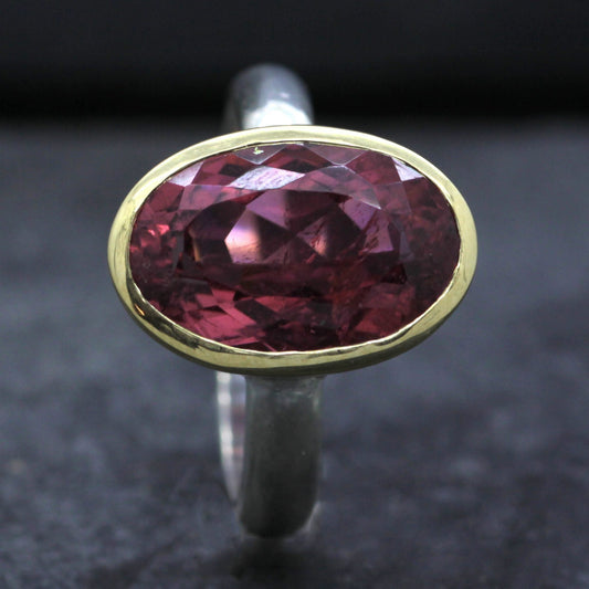 JS OVAL PEACH TOURMALINE SET IN 18CT YELLOW GOLD & STERLING SILVER